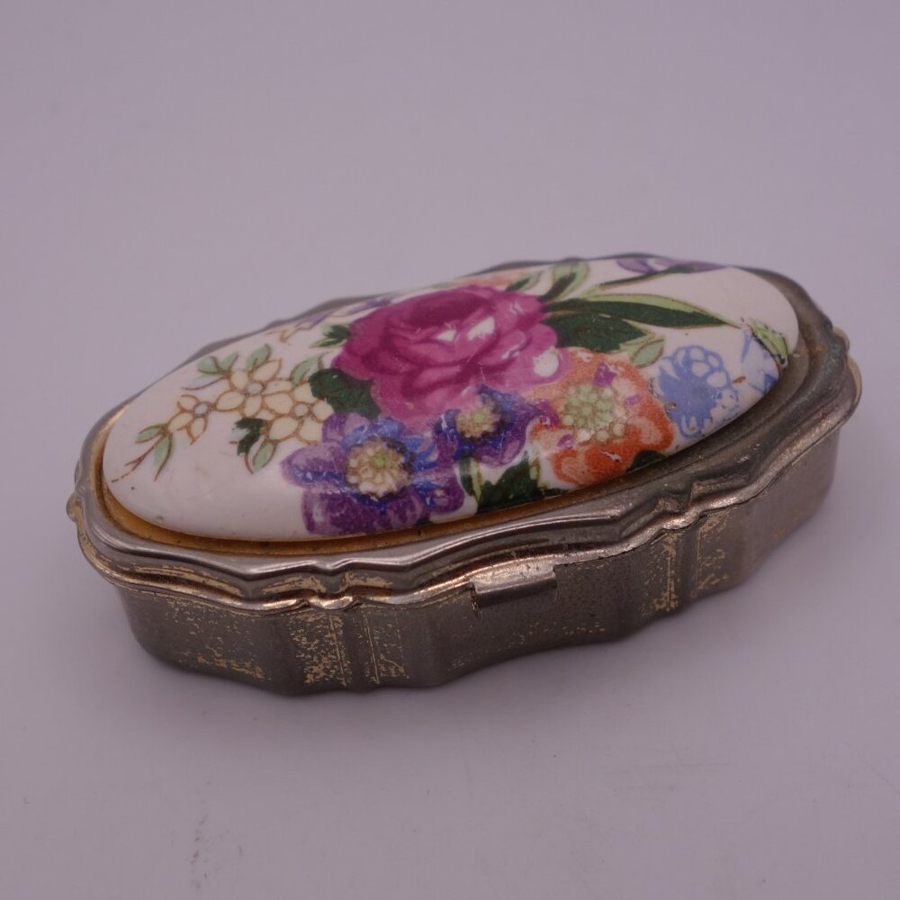 Vintage Metal Made in Japan Pill Box with Ceramic Top featuring Flower Design